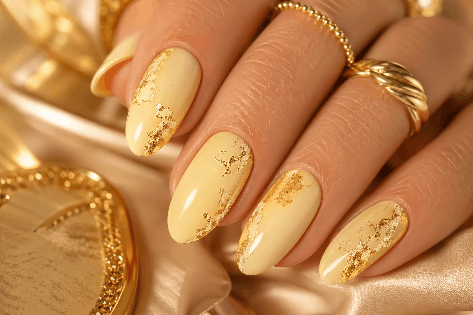 11 Butter Yellow Nails That Feel Soft & Chic 8 Butter yellow nails with gold foil accents and luxury finish