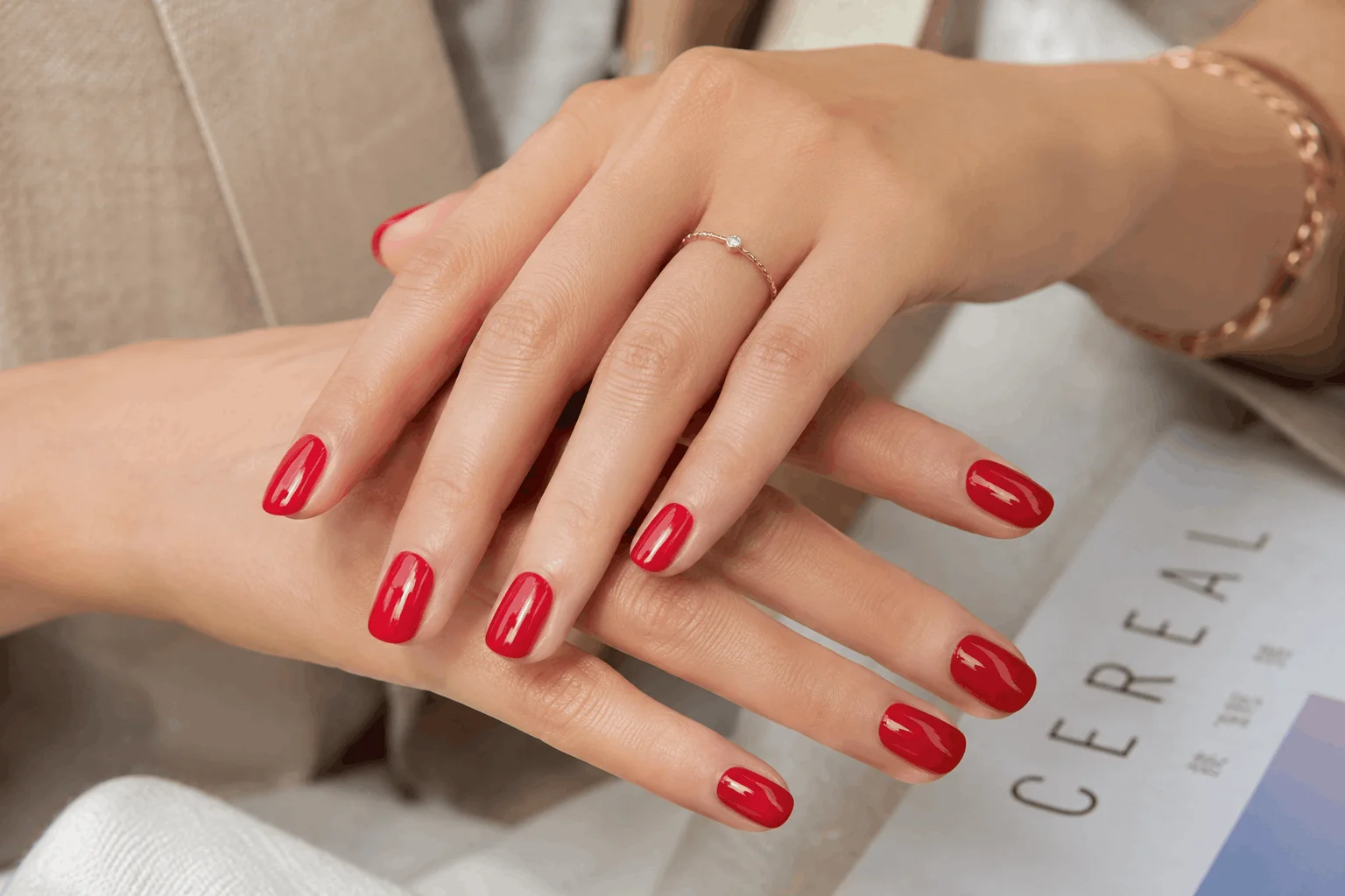 9 Red Nail Ideas That Will Instantly Elevate Your Look 3 Classic glossy red manicure on elegant hands