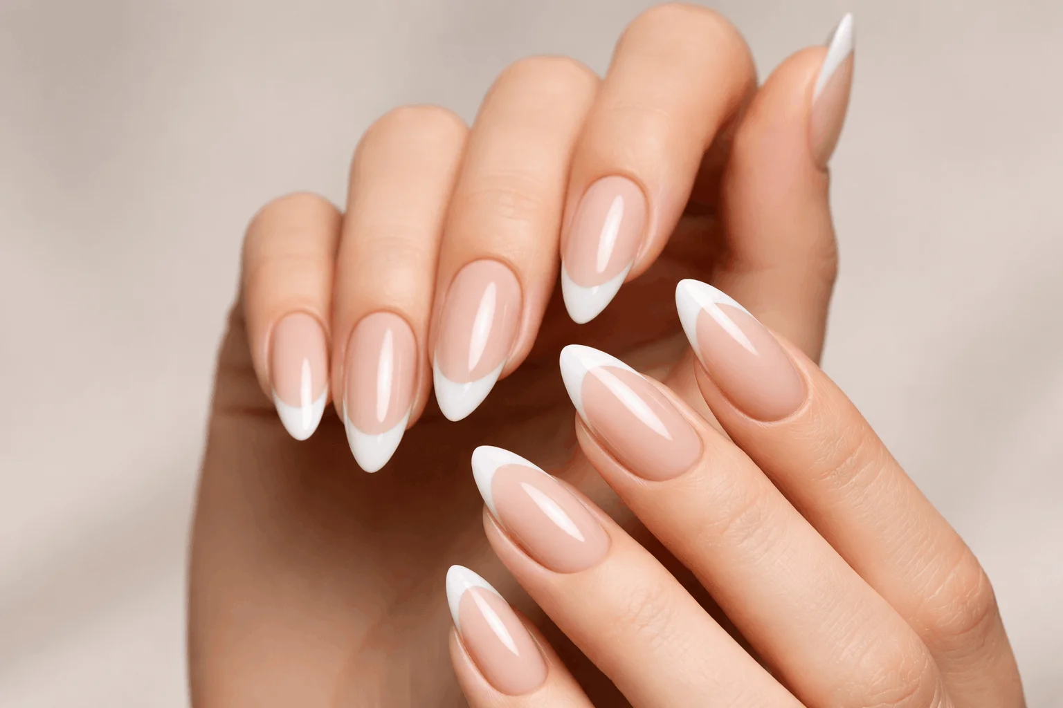 21 White French Tip Nails That Look Clean & Chic 4 Almond shaped white french tip nails glossy finish