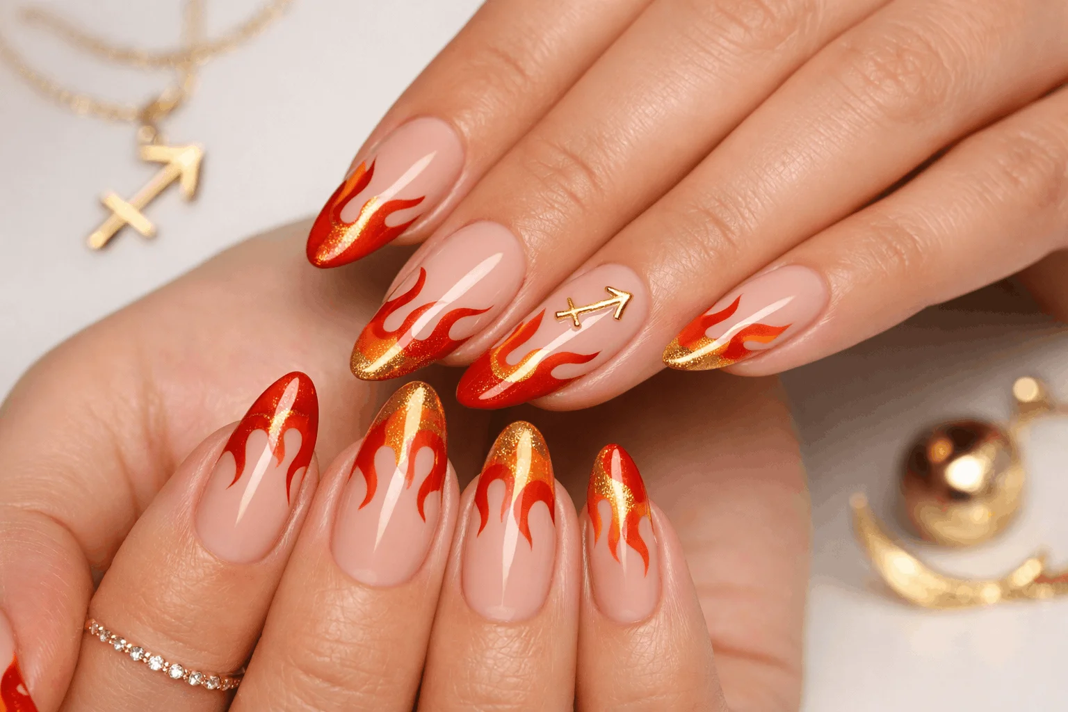 23 Sagittarius Nails Ideas Inspired by Zodiac Power 1 Fire flame French tip Sagittarius nails with red and gold fire sign design