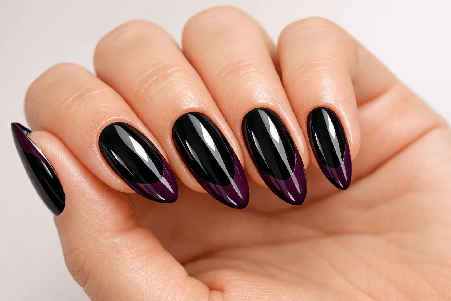 21 Black and Purple Nails Ideas That Look Expensive 2 Glossy black nails with deep plum French tips on almond shape