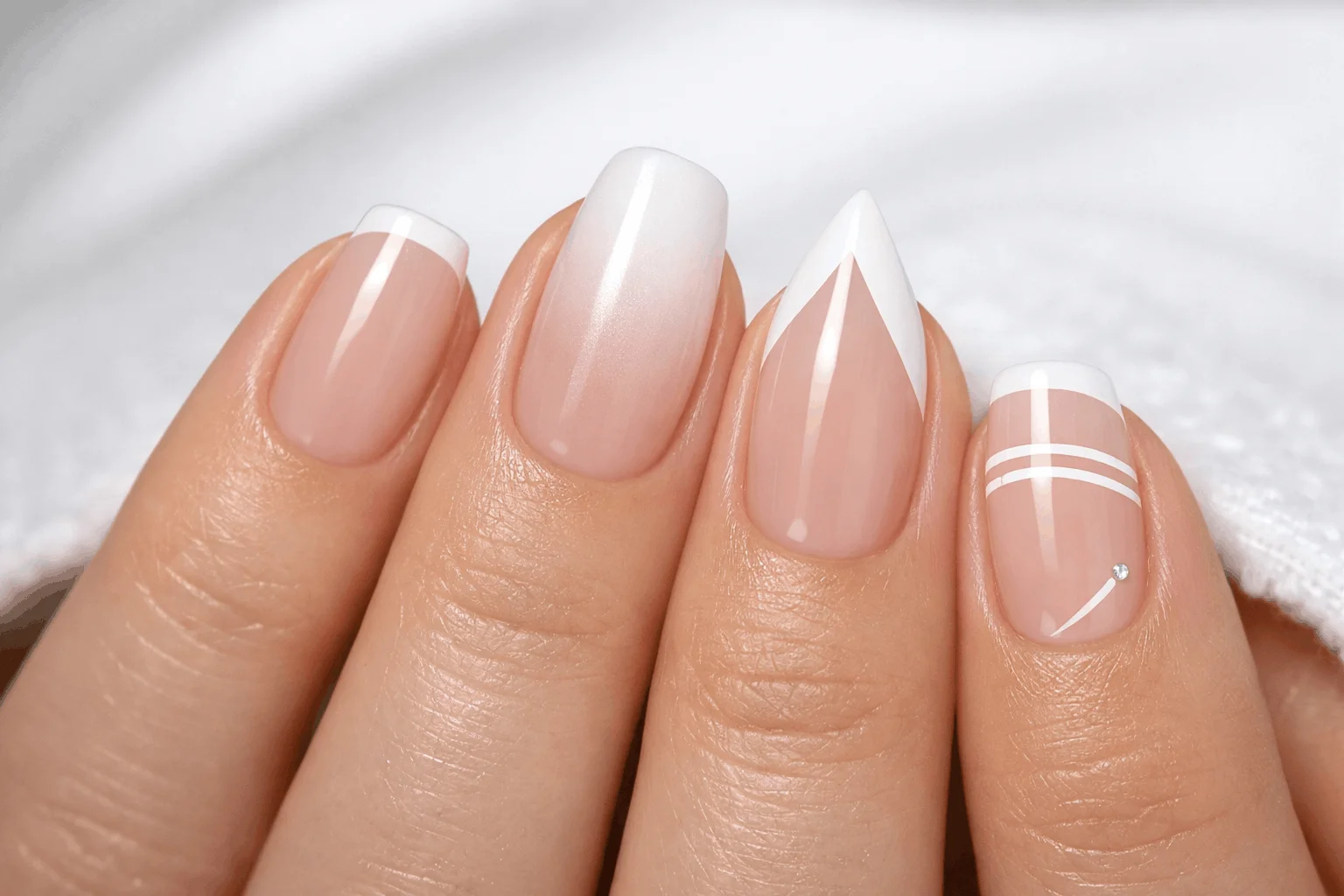 21 White French Tip Nails That Look Clean & Chic 5 Modern white French tip nails with ombre, micro, and V-cut designs