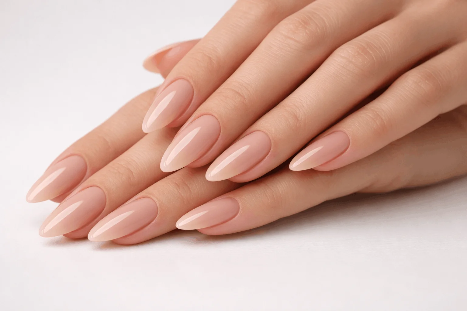 15 Elegant Nails That Elevate Your Style Instantly 10 Almond-shaped nude elegant nails