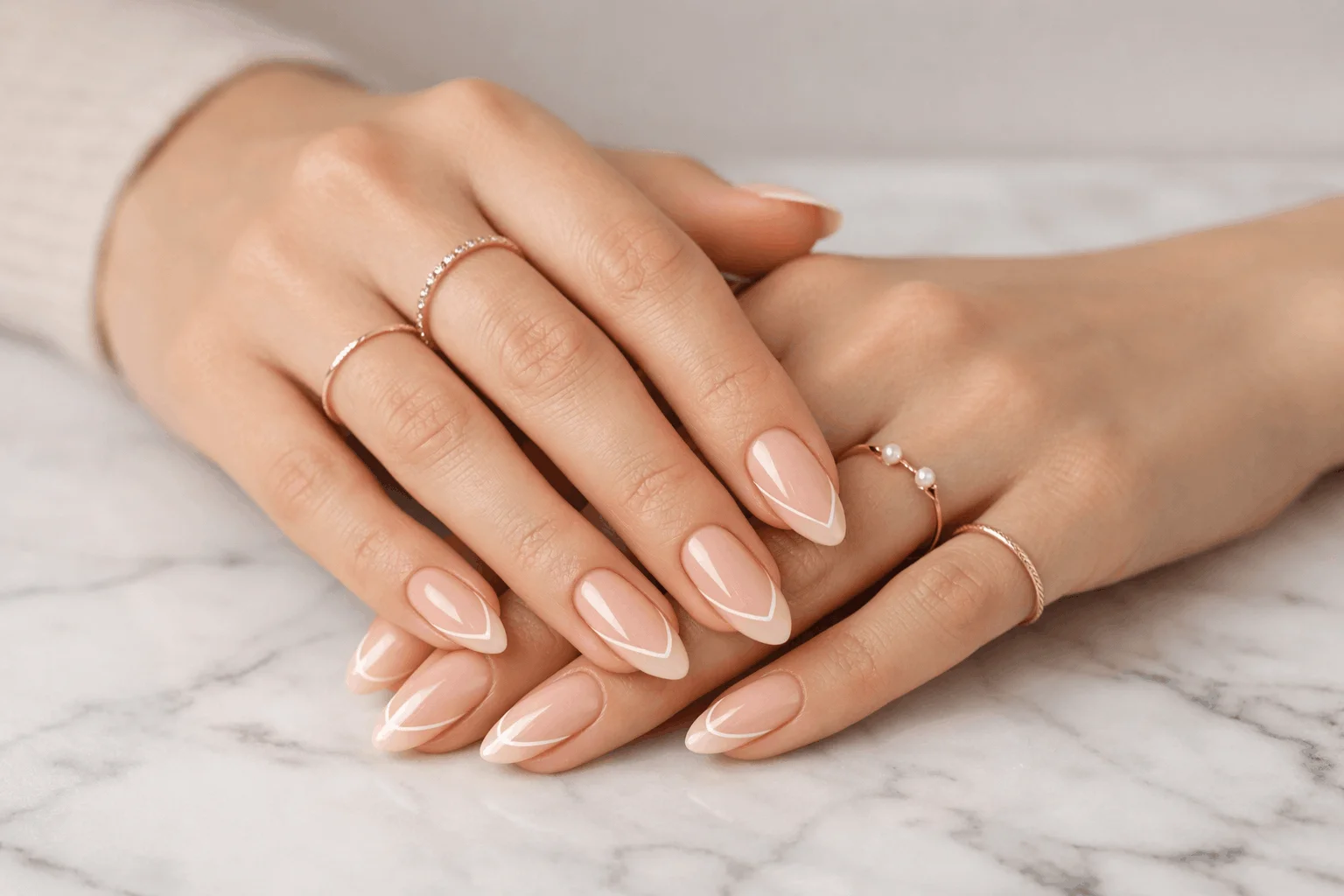 18 Nude Nails and Minimalist Nails You’ll Love 2 Classic glossy nude nails on almond shaped manicure