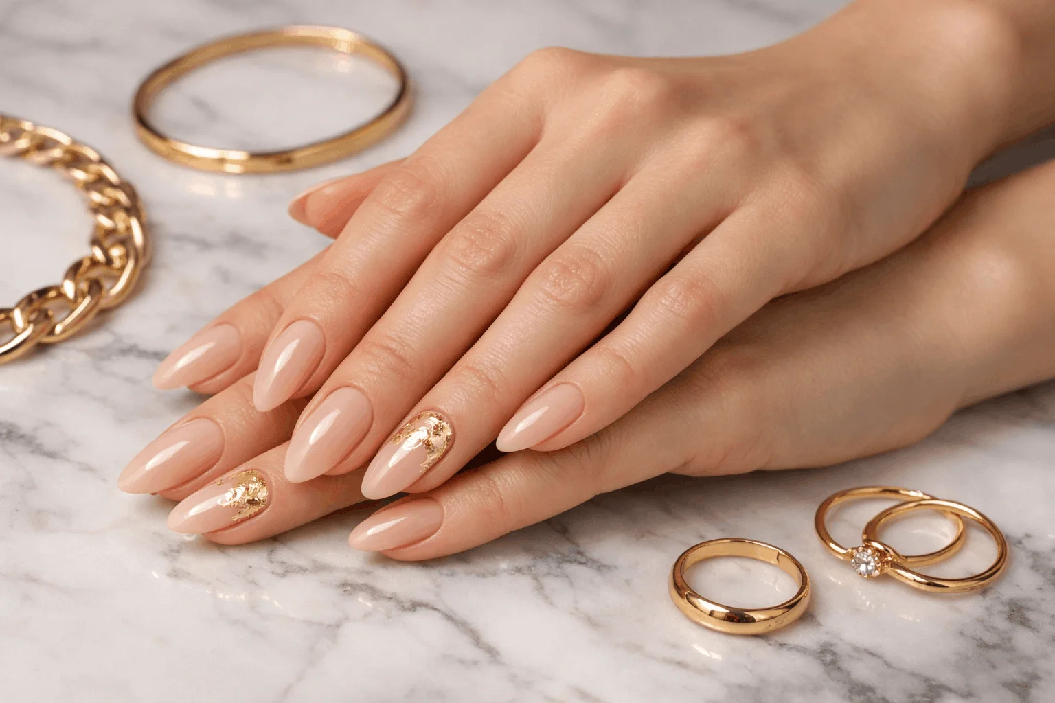 19 Birthday Nails That Will Make Your Party Shine 3 Elegant nude birthday nails with gold foil accents