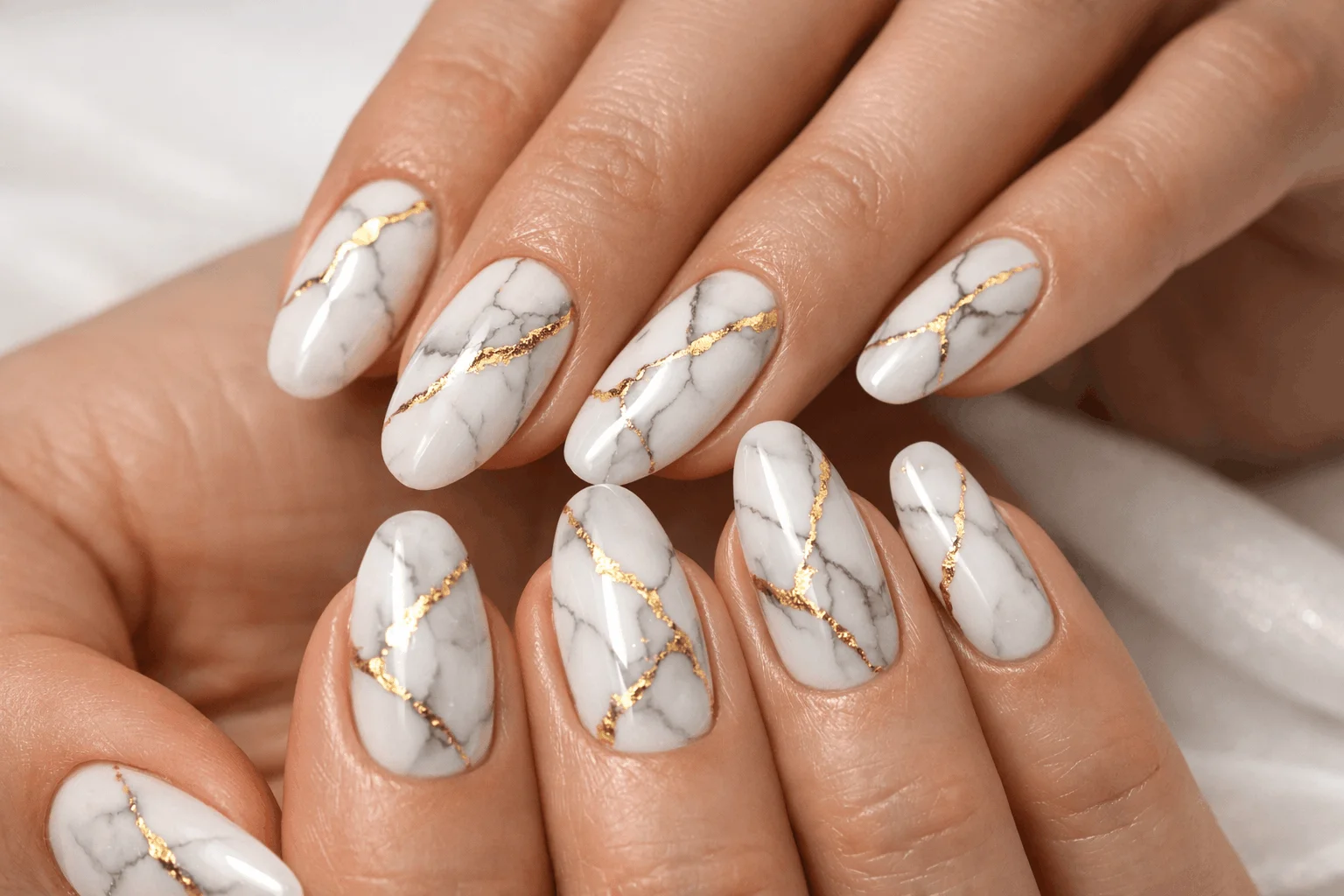 19 Gold Nail Designs That Elevate Your Style 10 Gold ombre nails with glitter gradient effect