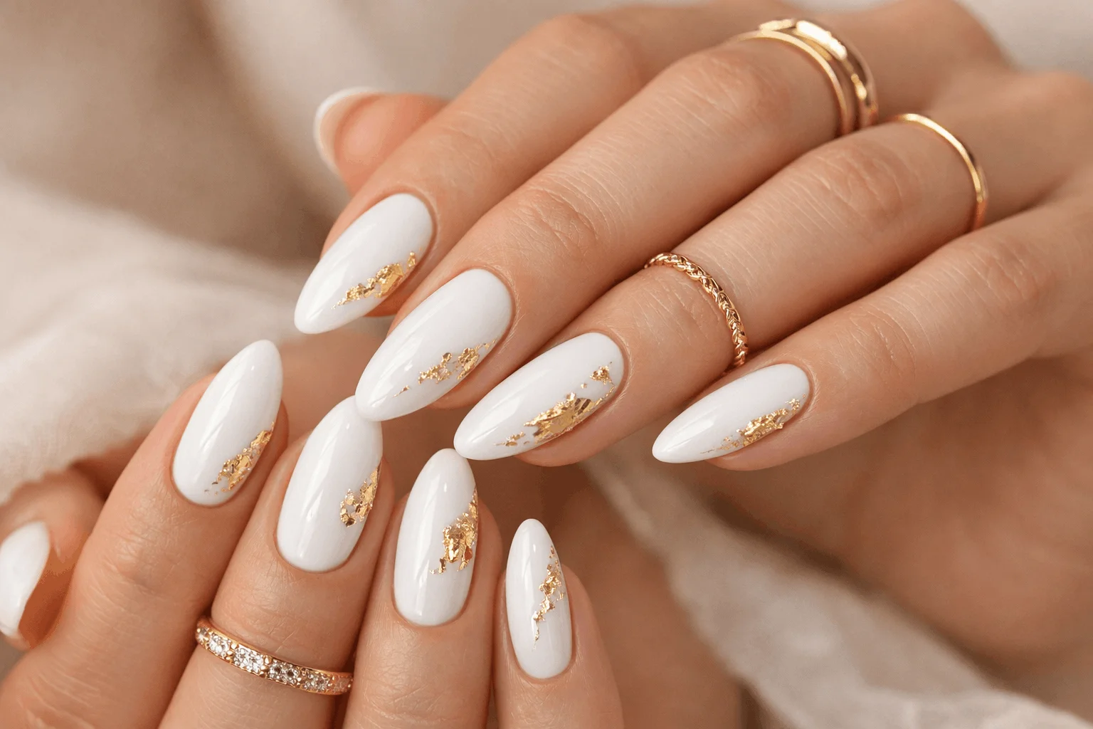 19 White Nails Designs That Feel Fresh and Elegant 7 White nails with gold foil luxury manicure