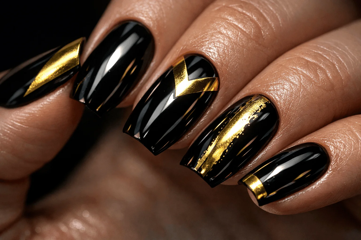 18 Gold Chrome Nails for a Chic Glam Look 11 black and gold chrome nails bold contrast design
