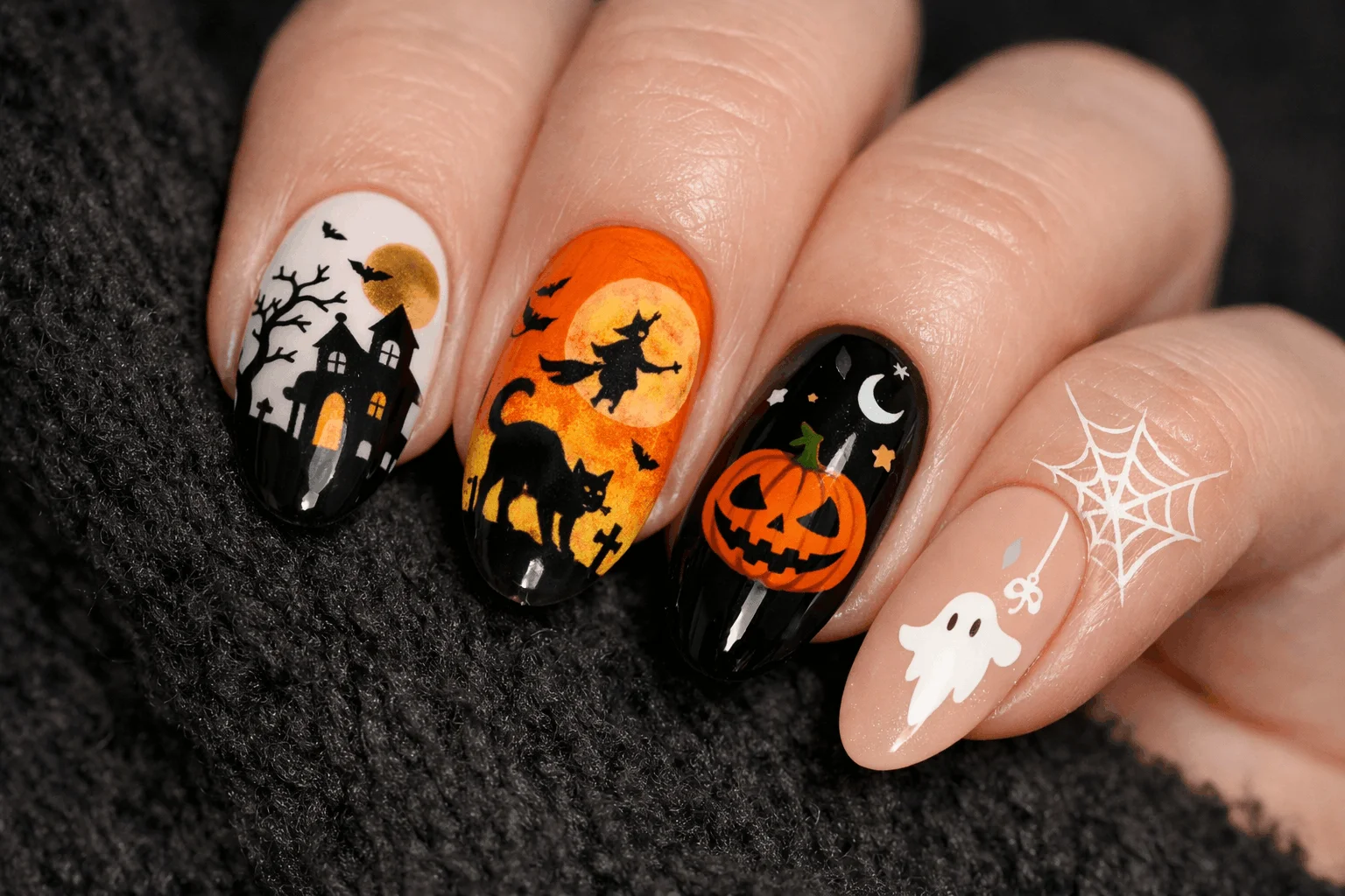 12 Halloween Cat Nails for a Spooky Chic Look 13 Mixed accent halloween cat nails with multiple designs