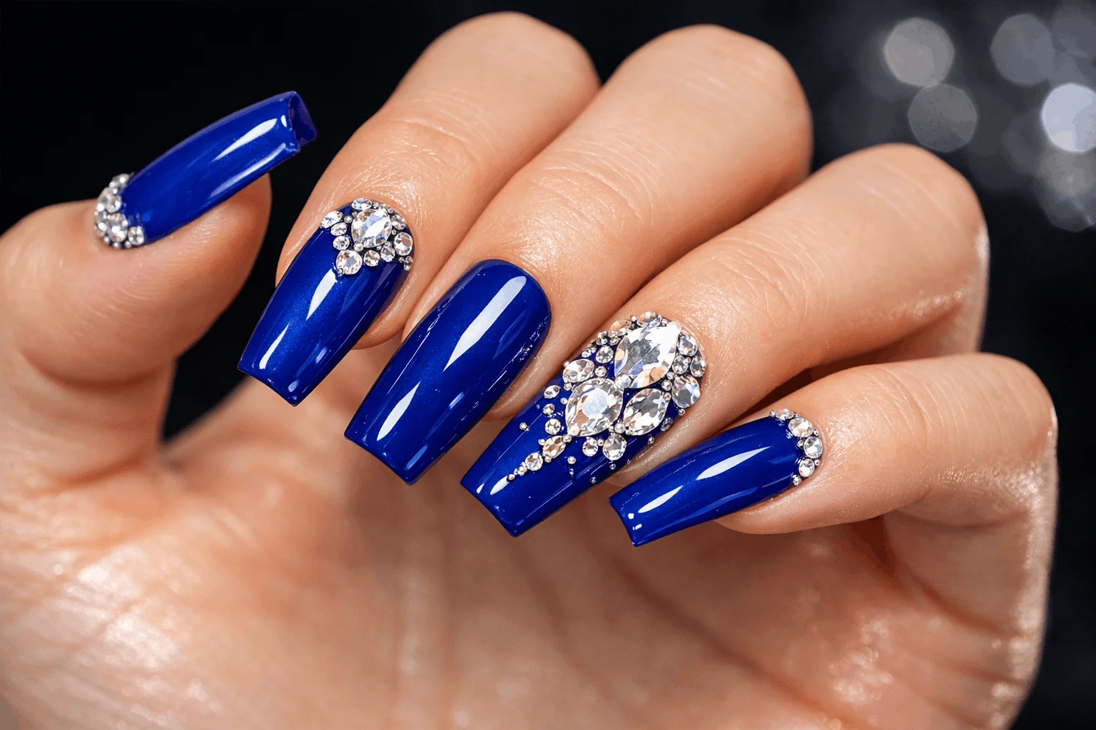 19 Royal Blue Nails for Stunning Manicures 4 Royal blue acrylic nails with rhinestones luxury design