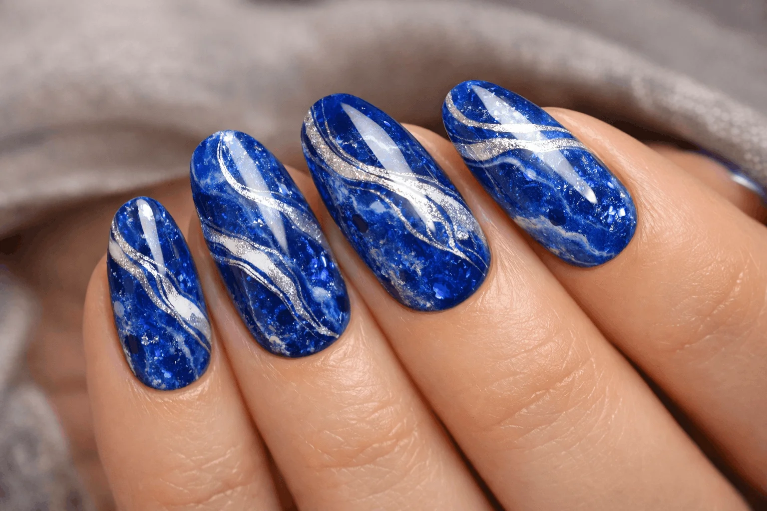 19 Royal Blue Nails for Stunning Manicures 9 Royal blue marble nails artistic textured design