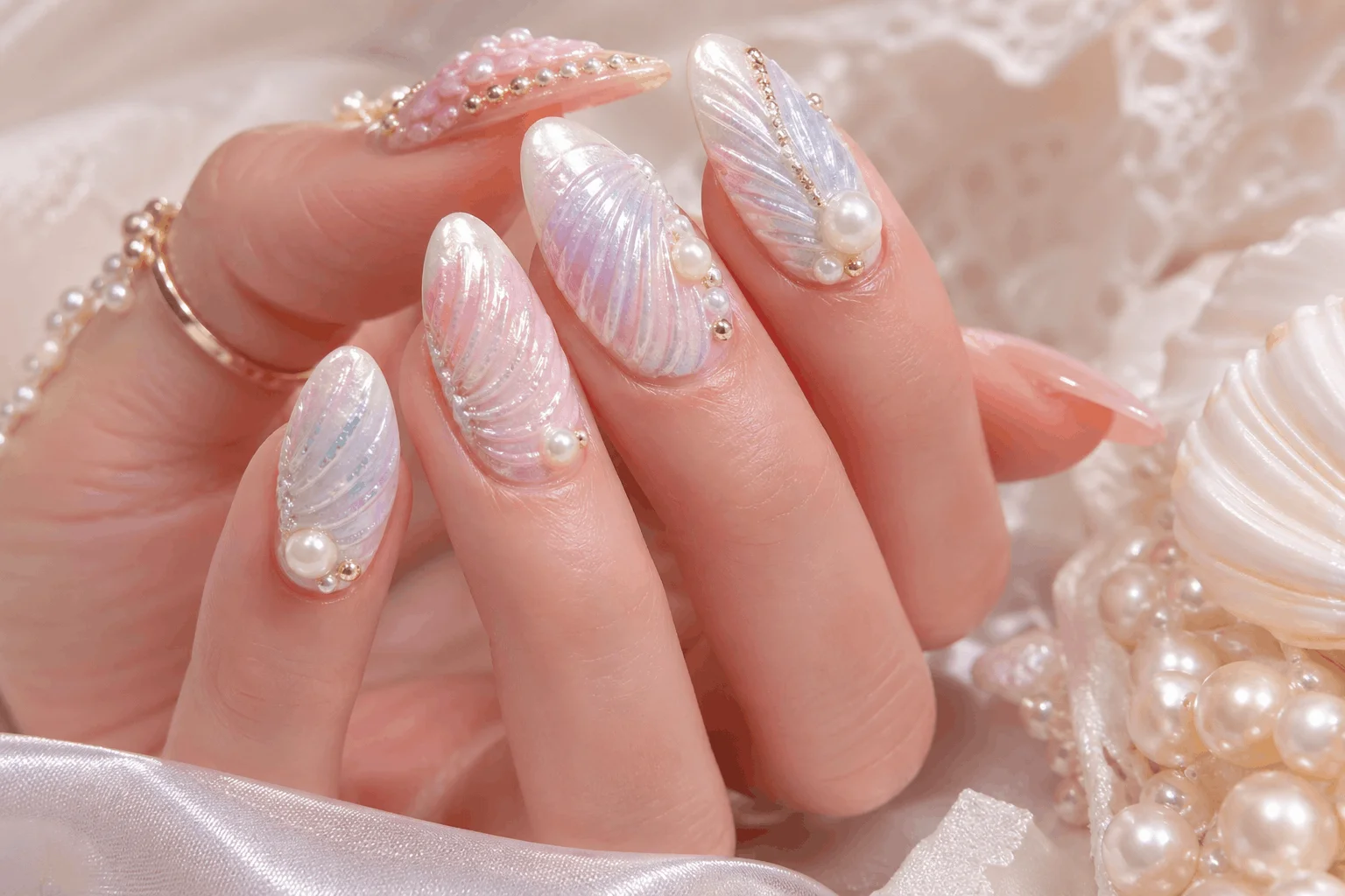 10 Mermaid Nails You Need for a Magical Glow Up 7 Seashell textured mermaid nails with pearls