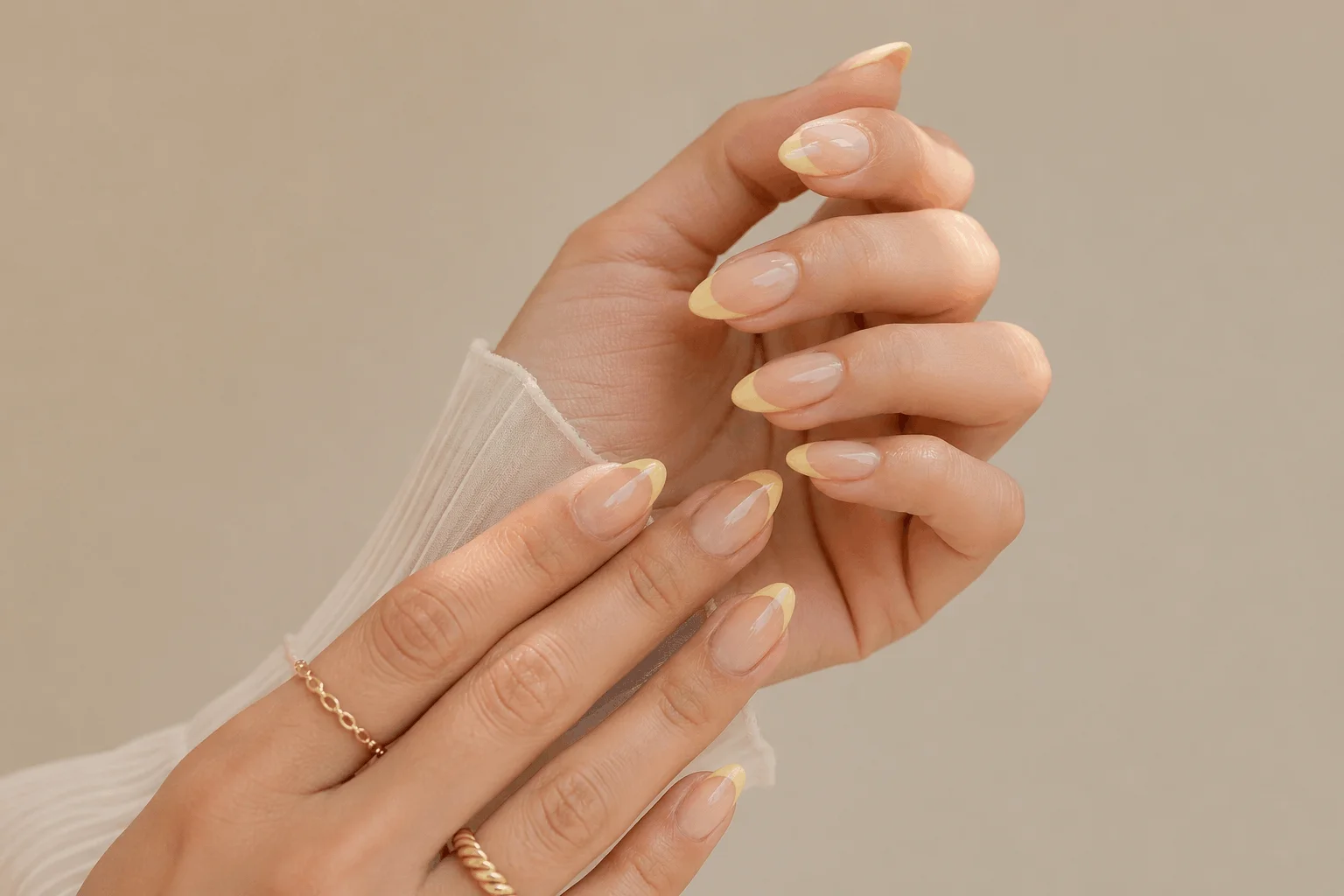 11 Butter Yellow Nails That Feel Soft & Chic 3 Butter yellow French tip nails on nude base with elegant almond shape