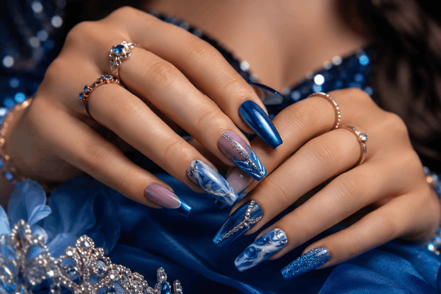 10 Blue Prom Nails That Will Steal the Spotlight Tonight 11 Creative mixed blue nail designs featuring chrome glitter and French tips