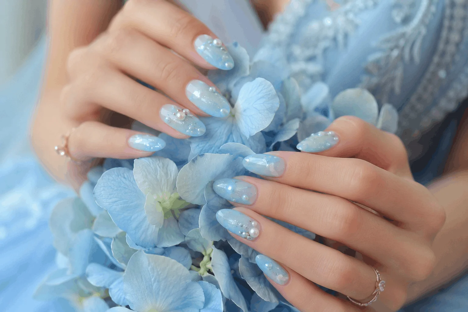 10 Blue Prom Nails That Will Steal the Spotlight Tonight 4 Light blue prom nails with pearl accents and soft feminine styling
