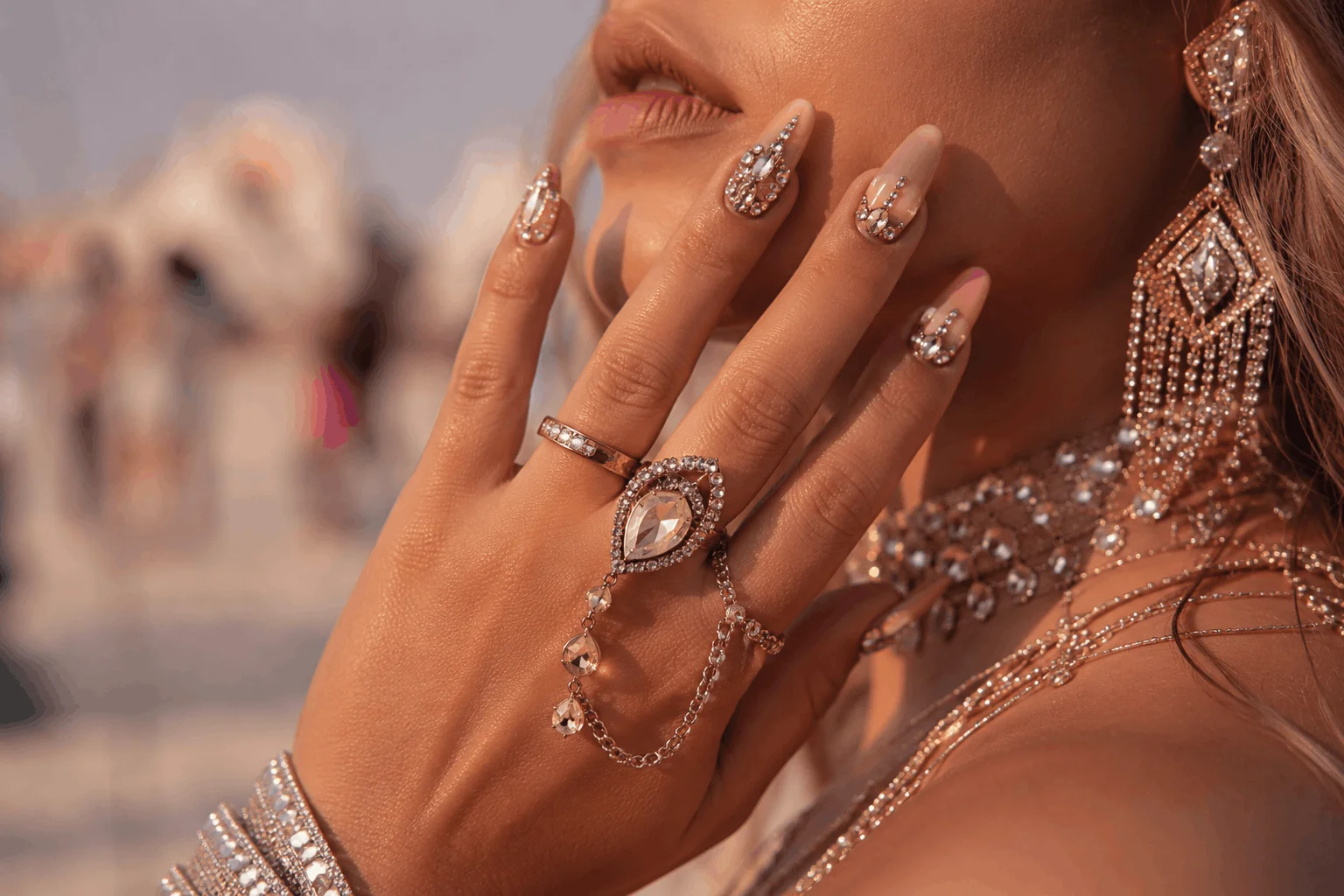 12 Coachella Nails Designs That Steal the Spotlight 11 Luxury rhinestone desert glam nails with crystal accents