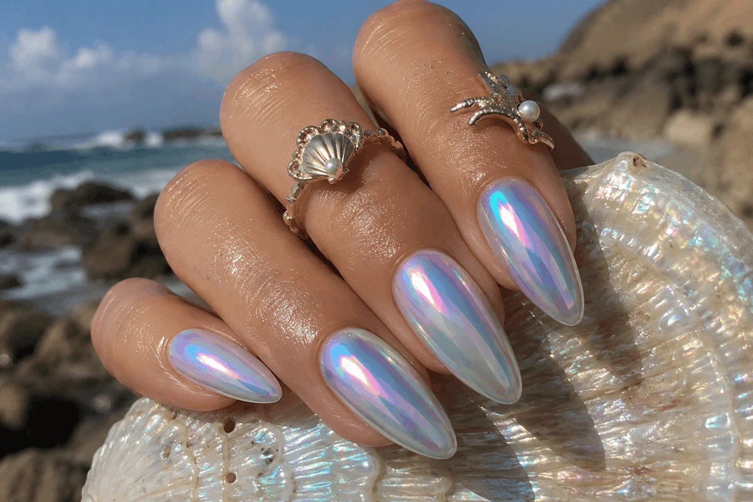 10 Summer Almond Nails for a Chic Beach Look 8 Mermaid chrome almond nails with iridescent summer shine