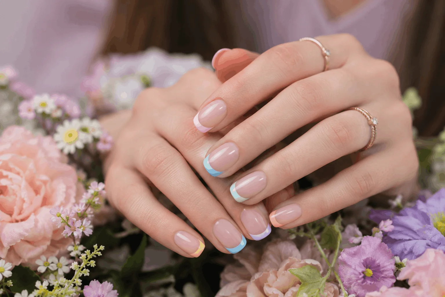10 Gorgeous Spring French Manicure Ideas You Need to Try 11 Multi-colored spring French manicure with rainbow pastel tips