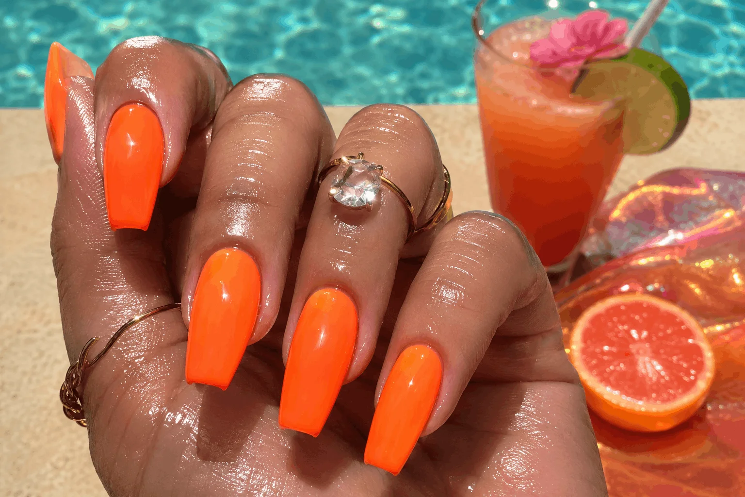 10 Orange Summer Nails That Scream Vacation Mode 4 Neon orange nails glowing in bright summer sunlight