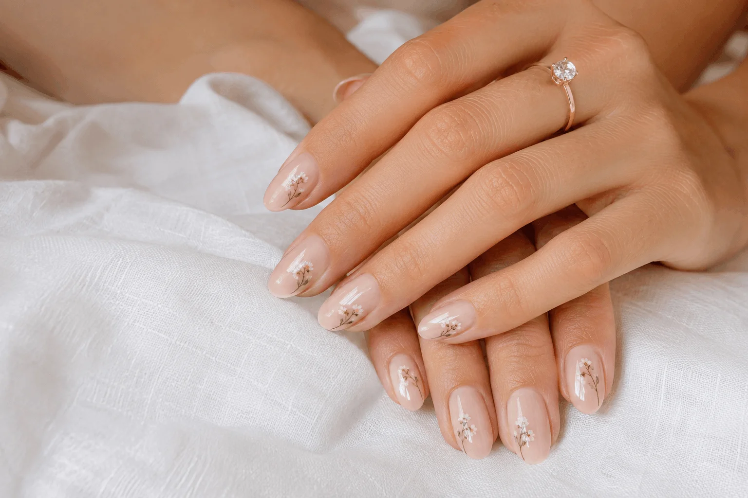 11 Summer Nails With Flowers You’ll Want ASAP 7 Nude summer nails with tiny minimalist flowers