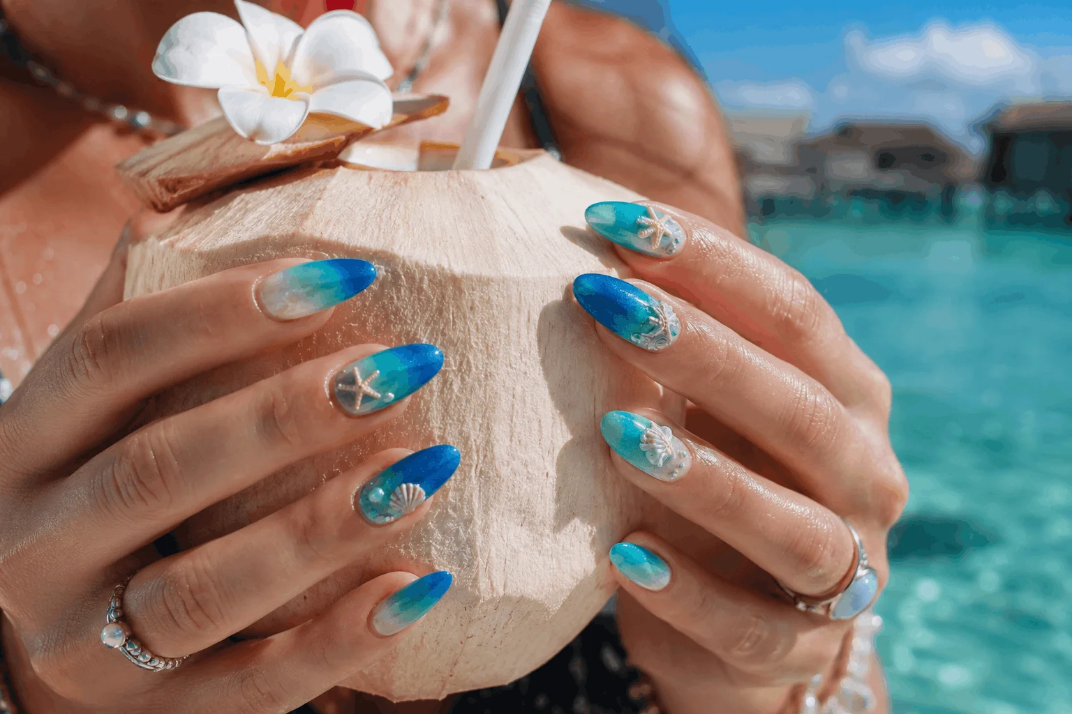 10 Summer Ombre Nails That Look Stunning in Photos 3 Ocean blue beach ombre nails near tropical water