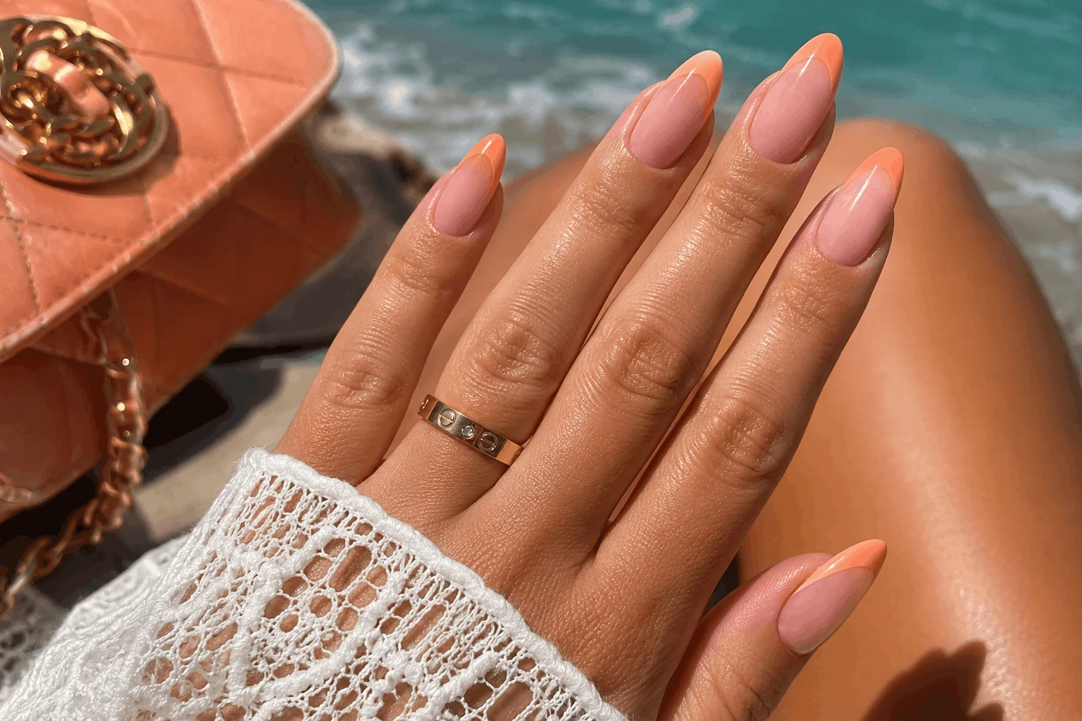 10 Summer Almond Nails for a Chic Beach Look 10 Peach French tip almond nails with classy summer manicure