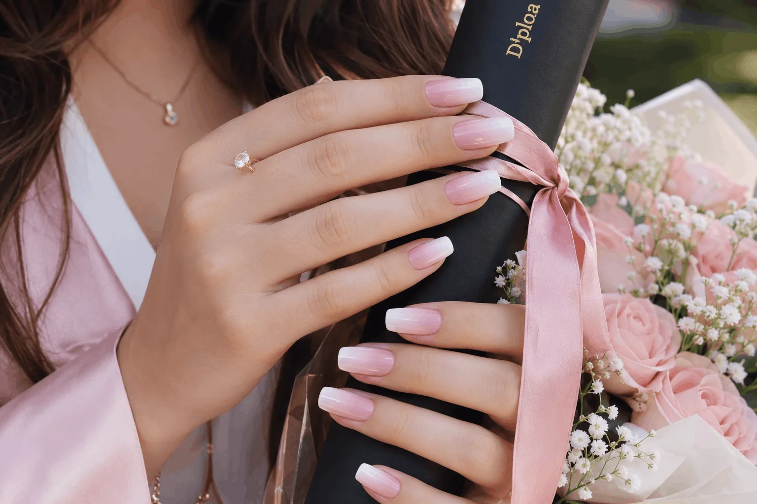 12 Cute Graduation Nails Perfect for Graduation Season 11 Pink and white ombre graduation nails with soft feminine style