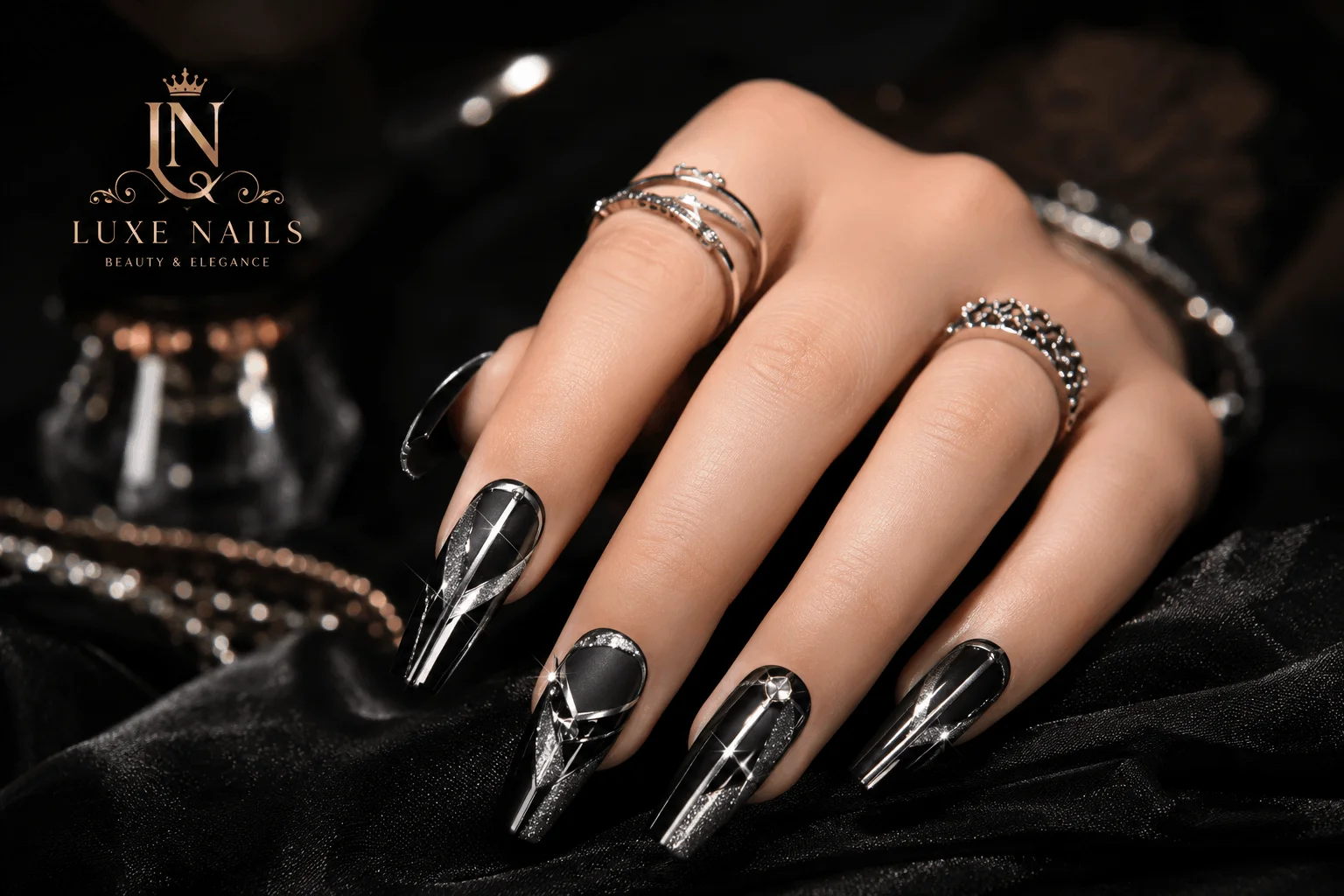 10 Black Coffin Nails That Make a Bold Statement 4 Black coffin nails with silver glitter and chrome details