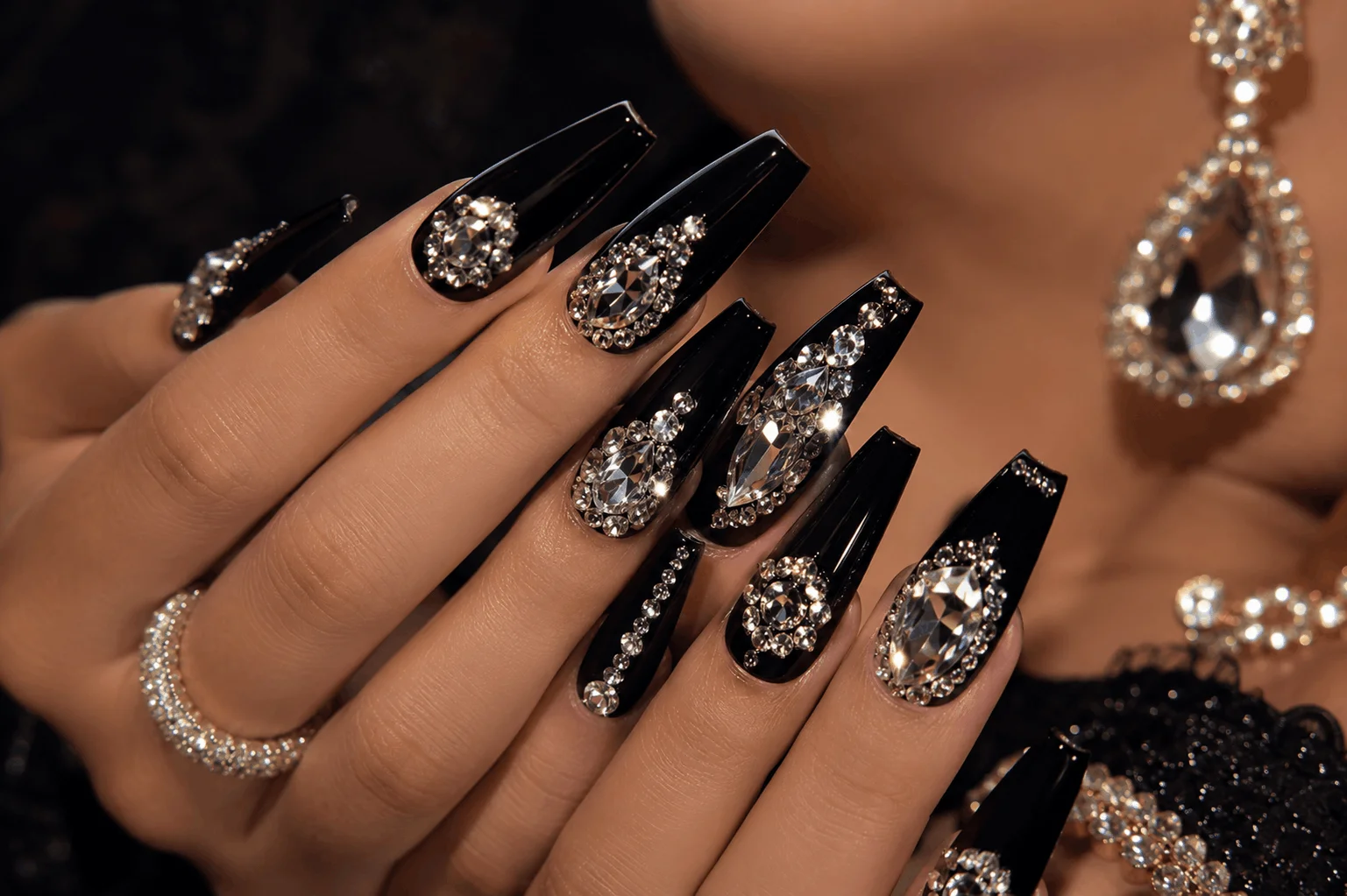 10 Black Coffin Nails That Make a Bold Statement 8 Black coffin nails with sparkling rhinestone embellishments