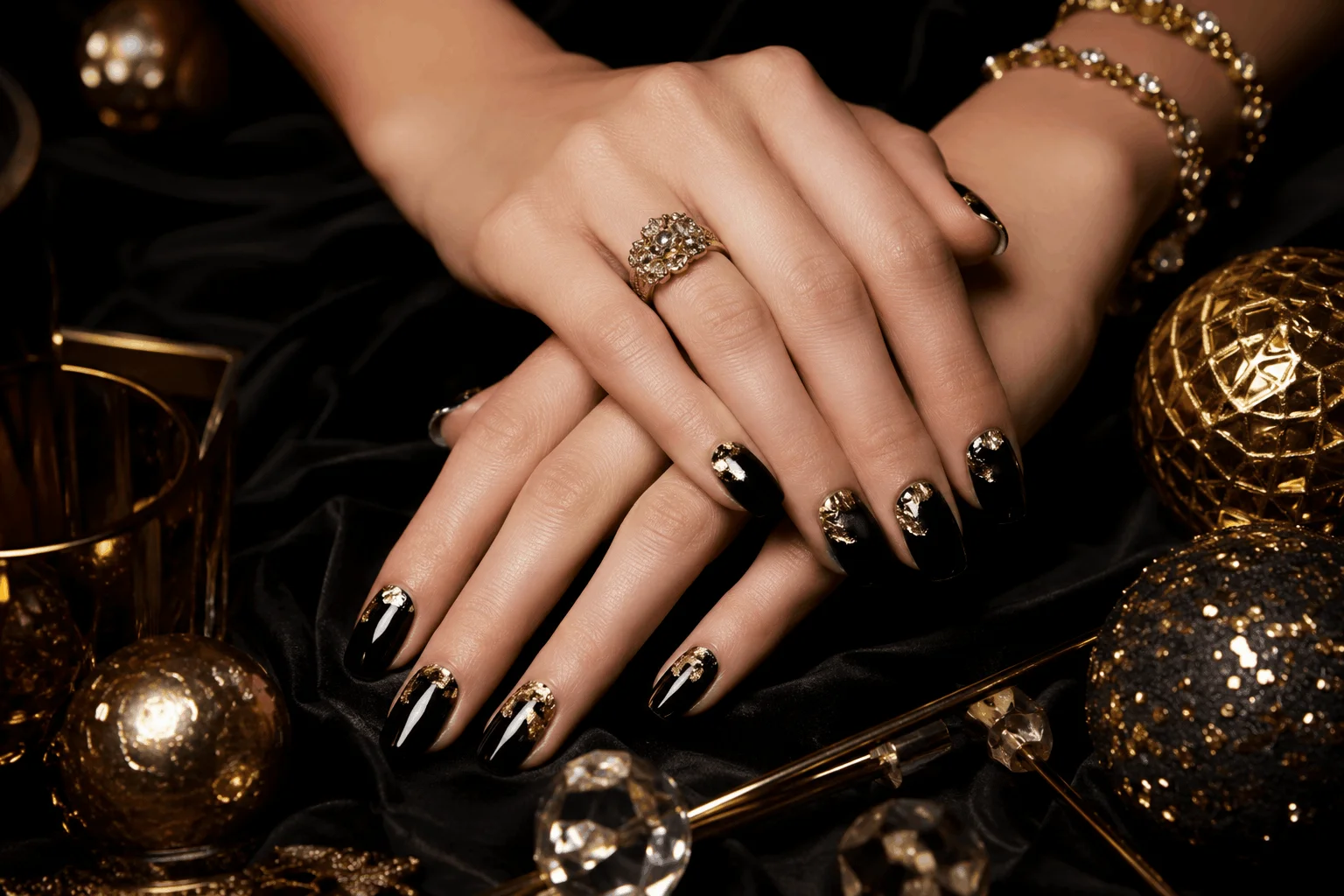 10 New Year Gel Nails That Look Instantly Chic 4 Black gel nails with gold foil accents