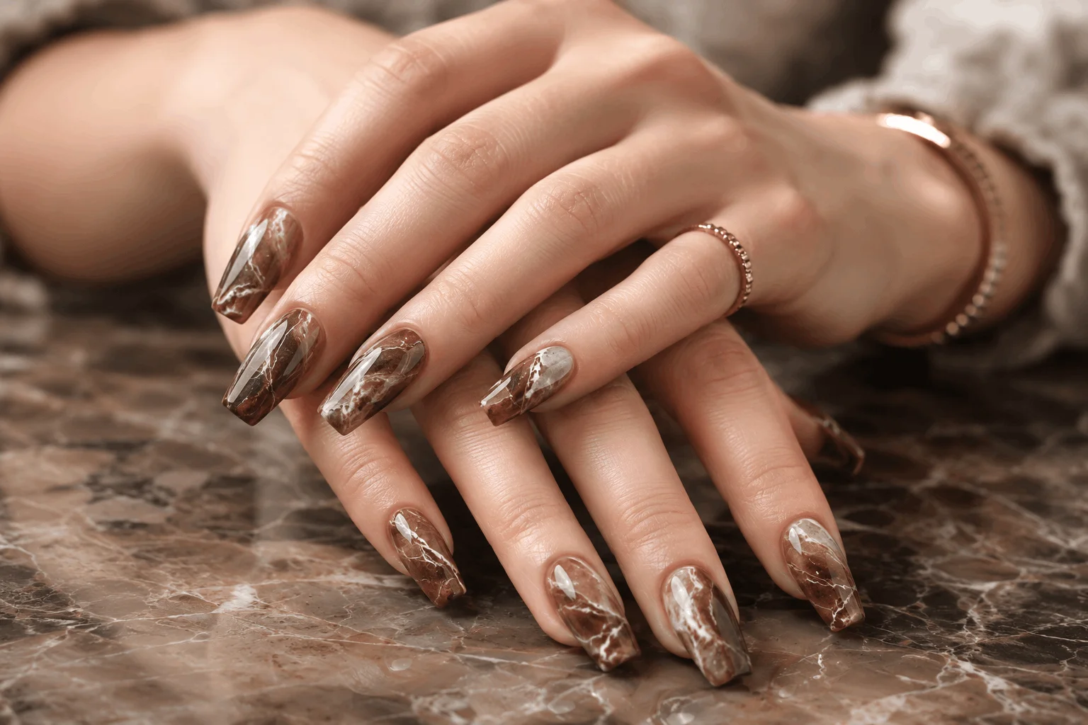 10 Brown Acrylic Nails Everyone Will Save in 2026 7 Brown marble acrylic nails with luxury stone effect