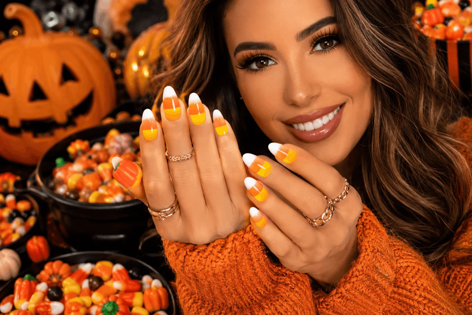 10 Halloween Nails Too Cute to Miss This Year 7 Candy corn inspired Halloween nail design with festive colors.