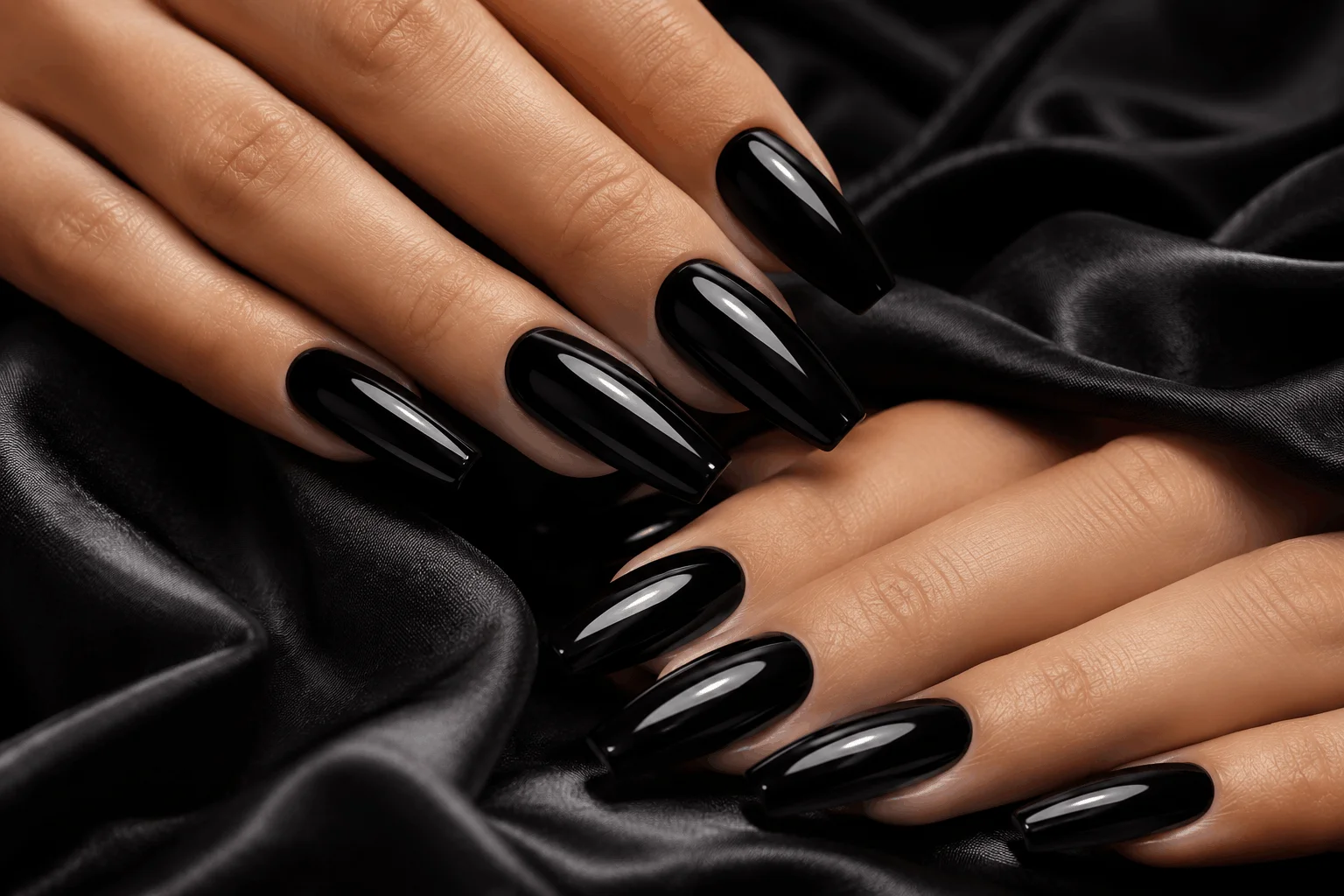 10 Black Coffin Nails That Make a Bold Statement 2 Classic glossy black coffin nails with mirror shine
