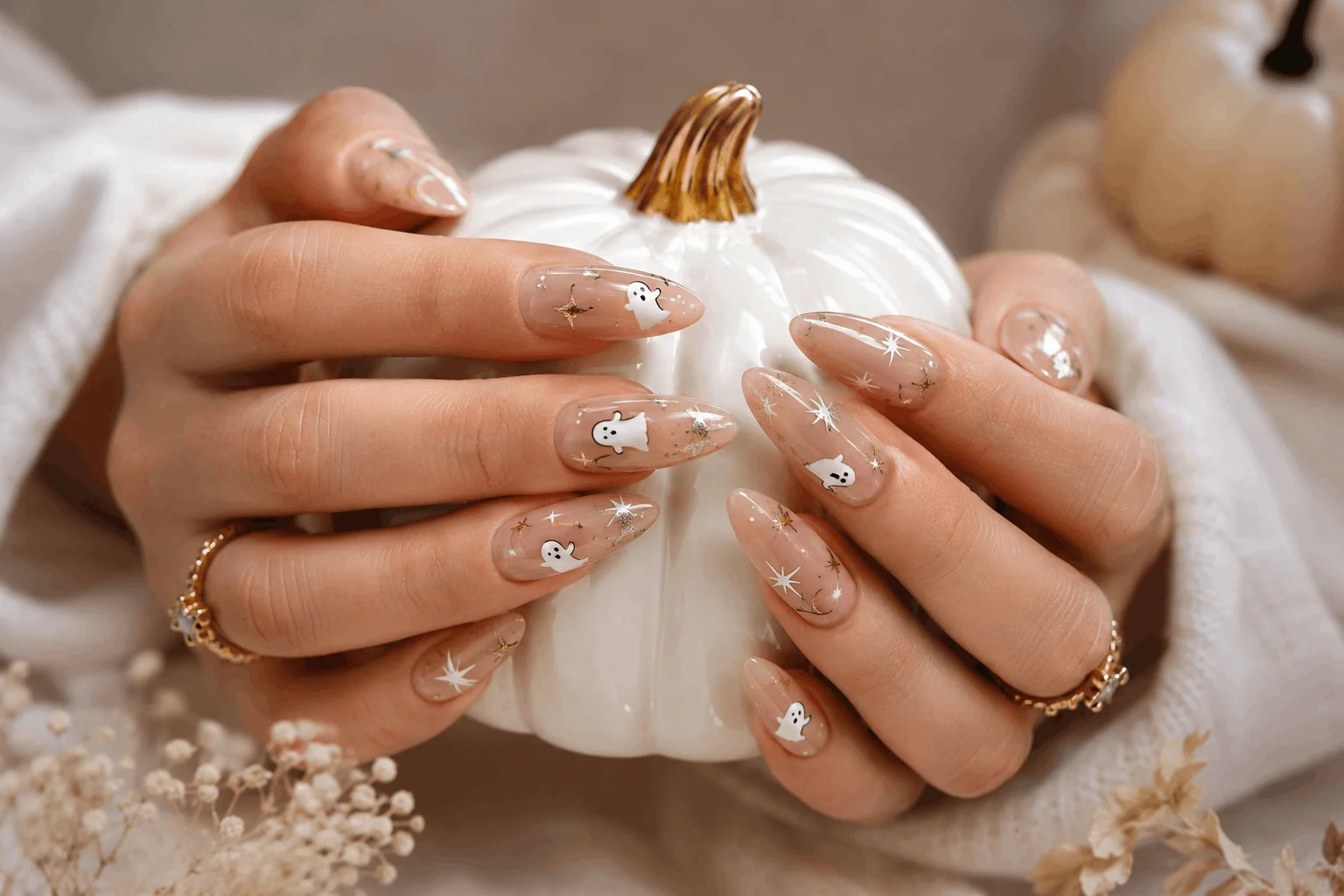 10 Halloween Acrylic Nails You'll Want This Spooky Season 3 Cute Halloween acrylic nails with ghost nail art.