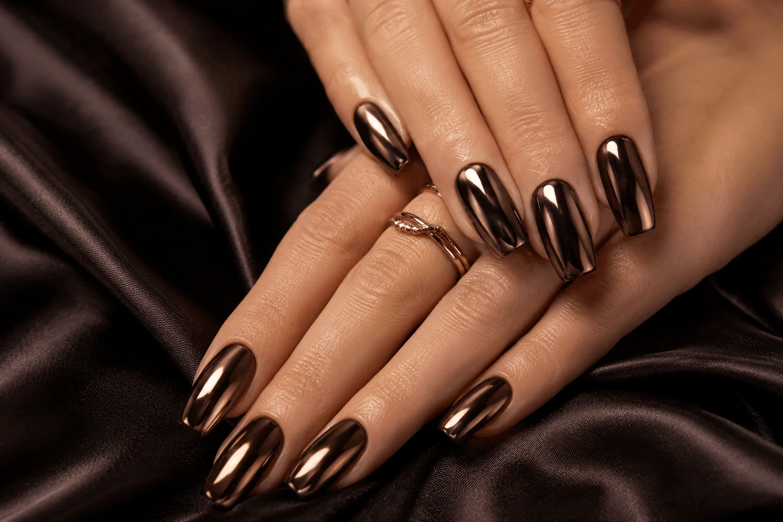 10 Brown Chrome Nails Everyone Will Save This Year 6 Dark brown mirror chrome nails with reflective shine