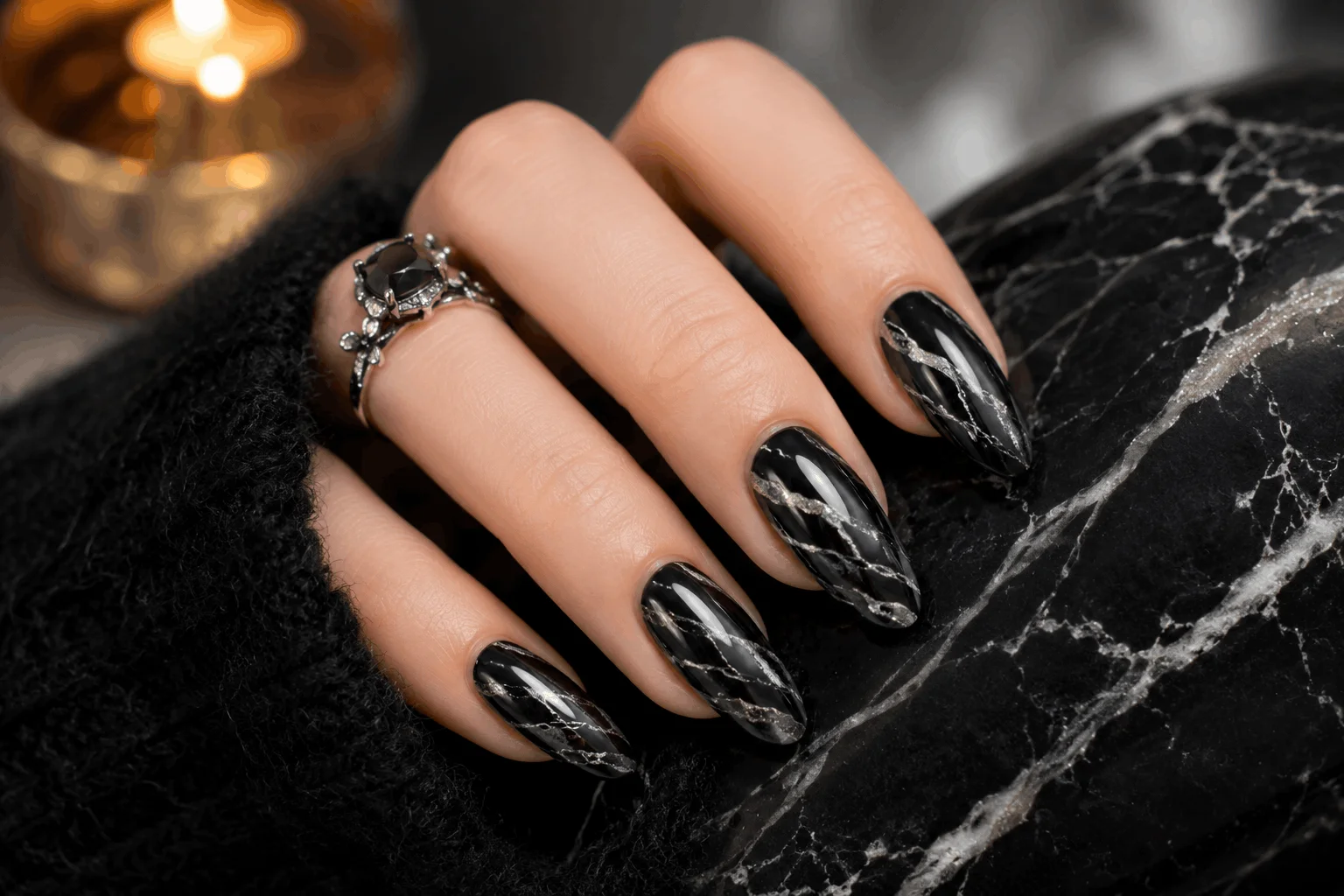 12 Black Winter Nails That Are Stunning This Season 8 Elegant black marble nails with white veining details