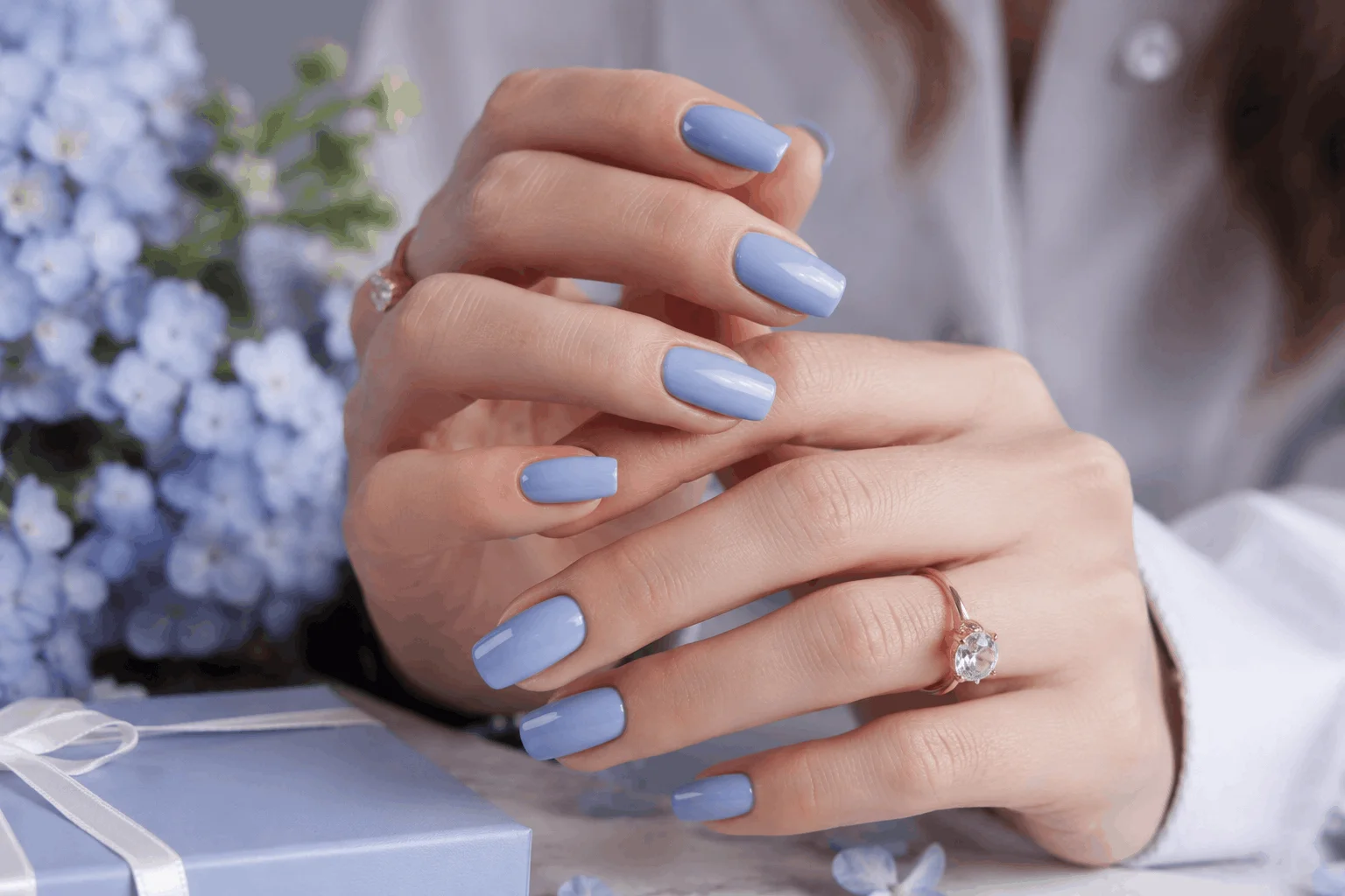 10 Blue Nail Ideas That Look Stunning All Year Long 2 Elegant light blue nails with glossy finish