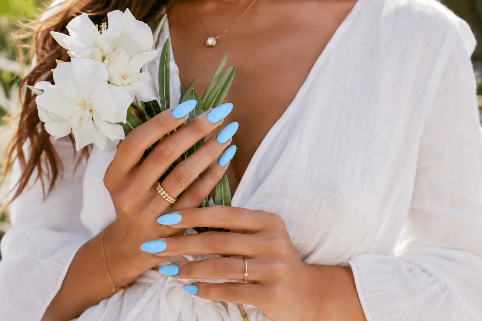 10 Summer Blue Nails You'll Want to Copy This Season 2 Glossy sky blue summer nails with elegant feminine style.