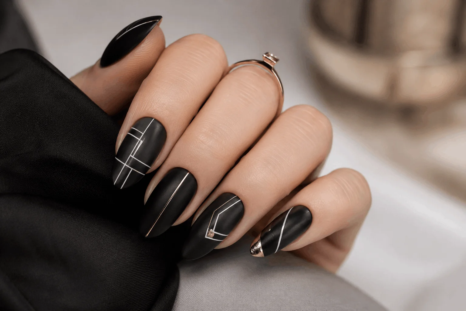 10 Black Coffin Nails That Make a Bold Statement 9 Minimalist black nail designs with clean geometric details