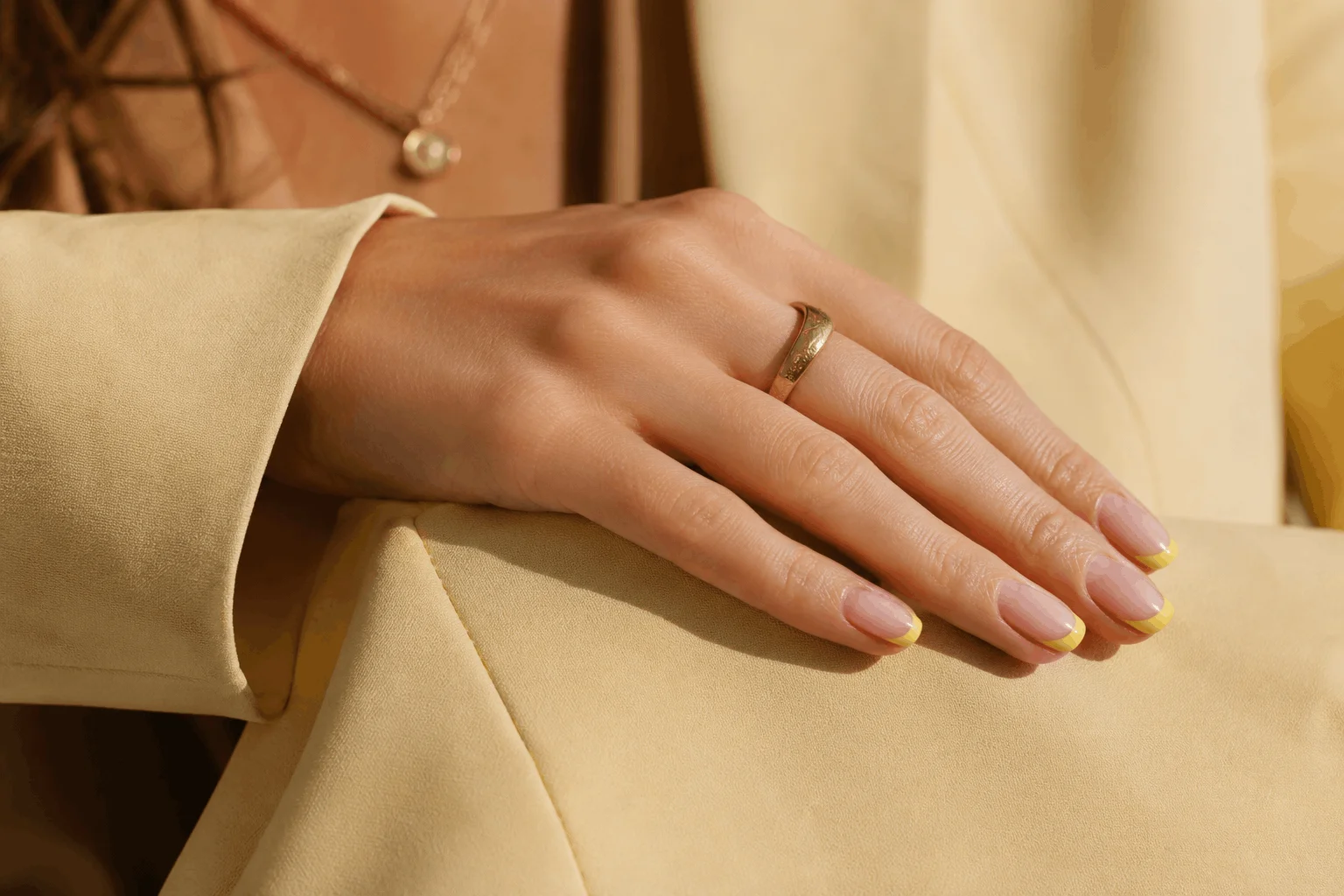 9 Yellow Spring Nails That Are Perfect for Sunny Days 7 Stylish yellow French tip manicure