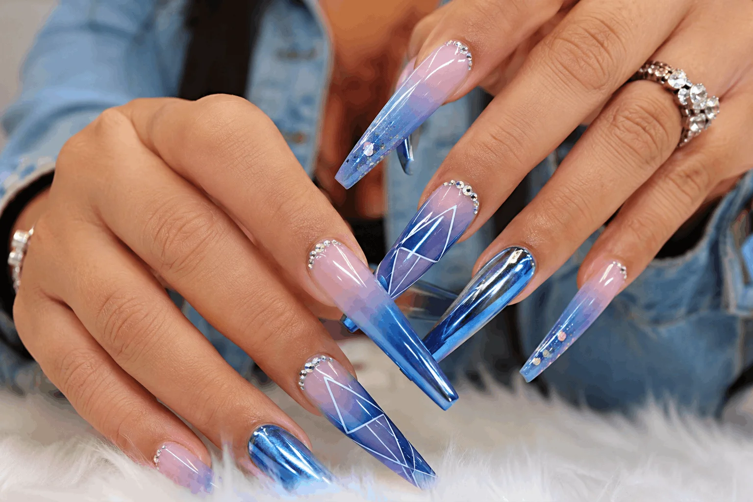 10 Blue Nail Ideas That Look Stunning All Year Long 4 Trendy blue acrylic nails with artistic designs