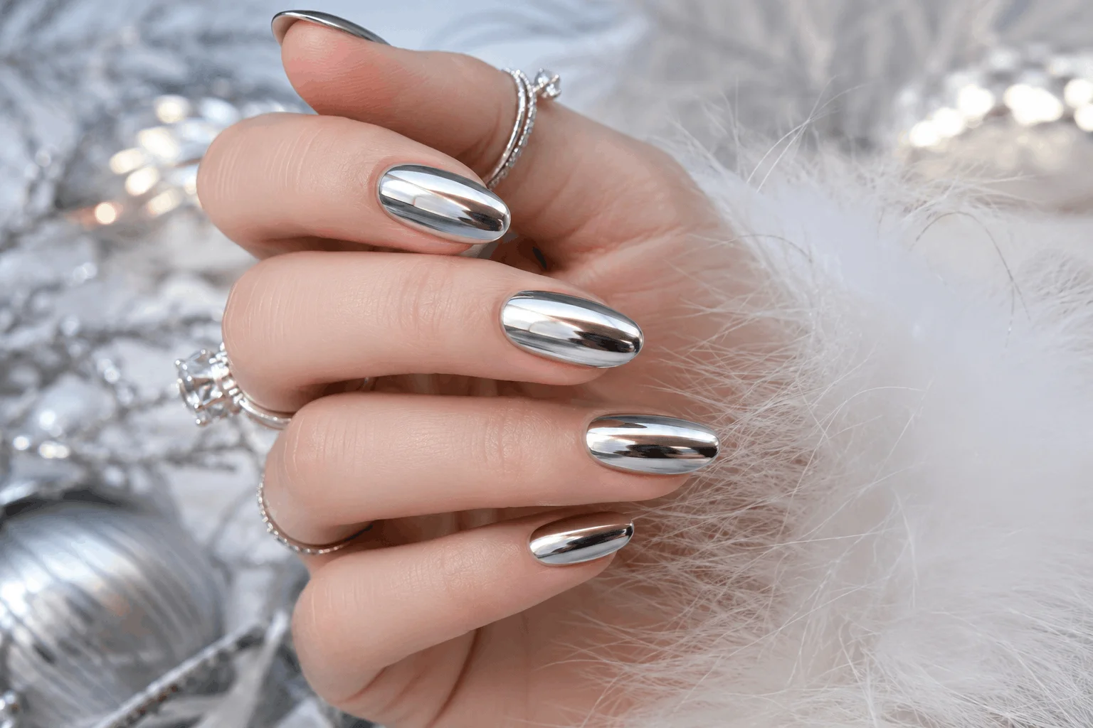 10 White Christmas Nails You'll Want This Winter 6 White winter nails with silver chrome finish